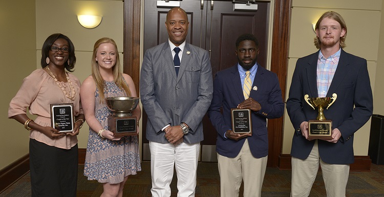 Greek-affiliated students are making a difference by doing service projects and raising more than $60,000 in funds for those in need. From left are Alexis Brown, president of Iota Nu City-Wide Chapter of Delta Sigma Theta Sorority, Inc.; Shelby Begley, president of Phi Mu Sorority; Dr. Michael Mitchell, vice president of Student Affairs and dean of students; Joshua Salter, president of the Zeta Kappa Chapter of Omega Psi Phi Fraternity, Inc.; and Nathan Jones, 2014 president of Sigma Chi Fraternity