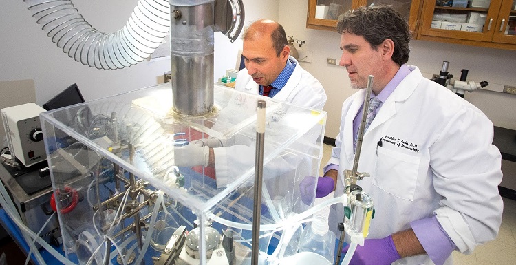 USA researchers Dr. Jonathon Audia, right, and Dr. Diego Alvarez recently developed a model of bacterial sepsis and pneumonia that can aid in the fight against antibiotic-resistant bacteria.