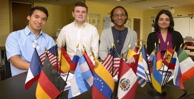 The essay contest was judged by members of USA's Phi Sigma Iota chapter and faculty members. Judges included, from left, Khanh Minh Trinh, majoring in Spanish and biology; Austin Gilchrist, majoring in Spanish and international studies; Eric Smith, majoring in French and psychology; and Dr. Zoya Khan, faculty advisor and associate professor of Spanish. 