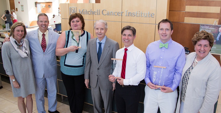 USA researchers were recently awarded grants through the Abraham A. Mitchell Cancer Research Fund. From left, Dr. Kim Littefield, assistant vice president for research development and learning; Dr. Mike Finan, MCI director; Dr. Luda Rachek, assistant professor in the USA College of Medicine, department of pharmacology; Abraham "Abe" Mitchell; Dr. Mark Taylor, associate professor in the USA College of Medicine, department of physiology and cell biology; Dr. Glen Borchert, assistant professor in the USA department of biology; and Dr. Laurie Owen, MCI associate director for basic and translational sciences and Barbara Colle Chair for oncological sciences.