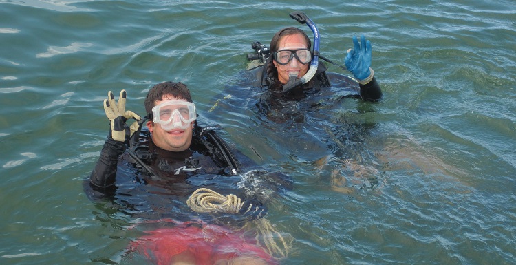 Graduate students in Mobile Bay.