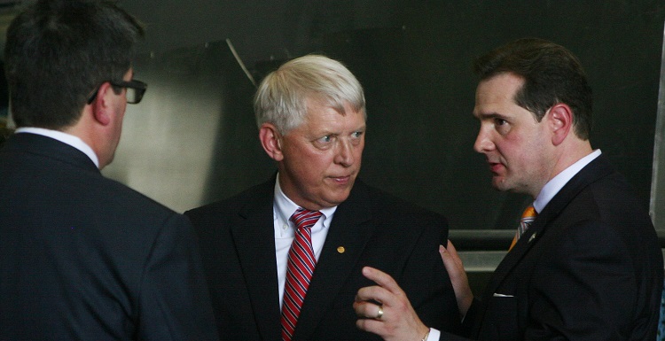 Dr. Tony Waldrop, USA president, center, talks with Delta Regional Authority Federal Co-Chairman Chris Masingill, right, and Mobile Area Chamber of Commerce President and CEO Bill Sisson at Wednesday's news conference to announce the designation of 12 new Manufacturing Communities. Southwest Alabama received the designation last year. 