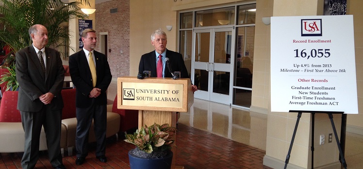 The University of South Alabama set a record enrollment with more than 16,000 students, an increase of 4.9 percent. At a news conference to announce the milestone, from left, are Dr. David Johnson, senior vice president for academic affairs; Christopher Lynch, interim director of enrollment services; and President Dr. Tony G. Waldrop.