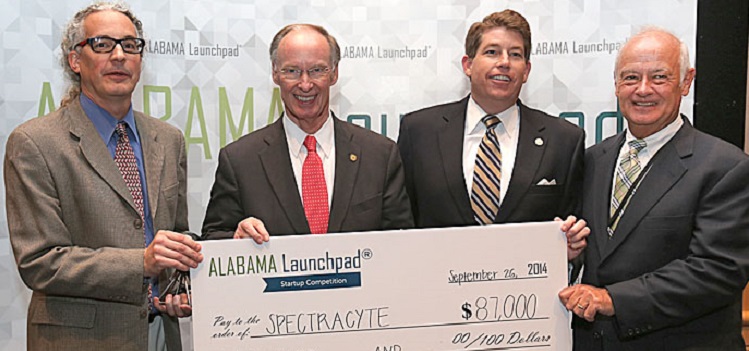The Alabama Launchpad Competition awarded SpectraCyte $87,000 for its research into creating advanced endoscopic imaging technology for cancer detection. From left, Dr. Thomas Rich, USA associate professor of pharmacology; Gov. Robert Bentley; Jim Byard Jr.,  director of the Alabama Department of Economic and Community Affairs; and EDPA President Bill Taylor. Photo courtesy of Gary Tramontina for Alabama Launchpad. data-lightbox='featured'