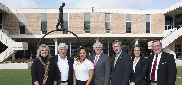 ?Setting the Pace,? a sculpture on the lawn of the Student Center amphitheater, is a gift from David and Lynn Gwin. At the sculpture?s dedication, from left, are Lynn Gwin; David Gwin; SGA President Danielle Watson; USA President Dr. Tony G. Waldrop; Dr. John Smith, vice president for student affairs; Dr. Krista Harrell, associate dean of students; and Dr. Joseph F. Busta Jr., vice president for development and alumni relations.
