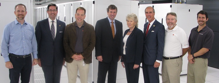 Southern Light recently completed a $5 million, Tier 3 data center at USA. From left are Paul Bullington, Southern Light CFO; Bill Sisson, president and CEO of the Mobile Area Chamber of Commerce; Eric Daniels, Southern Light COO; Andy Newton, Southern Light president and CEO; Lynne Chronister, USA vice president for research and economic development; Mobile Mayor Sandy Stimpson; Roy Franklin, Southern Light Data Center operations manager; and Davis Pilot, Southern Light operations strategic analyst.