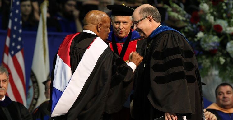 U.S. Rep. John Lewis was the commencement speaker for the University of South Alabama's 2015 Fall Commencement. He is joined on stage, from left, by Dr. Tony Waldrop, USA president, and Dr. David Johnson, provost and senior vice president for academic affairs.