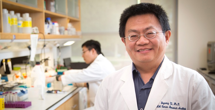 Dr. Yaguang Xi, an associate professor of oncologic sciences at MCI, was named the 2015 recipient of the Mayer Mitchell Award for Excellence in Cancer Research.  data-lightbox='featured'