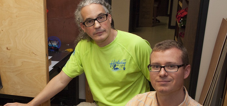 Dr. Silas Leavesley, foreground, assistant professor of chemical and biomolecular engineering, and Dr. Thomas Rich, associate professor of pharmacology, are co-founders of SpectraCyte.