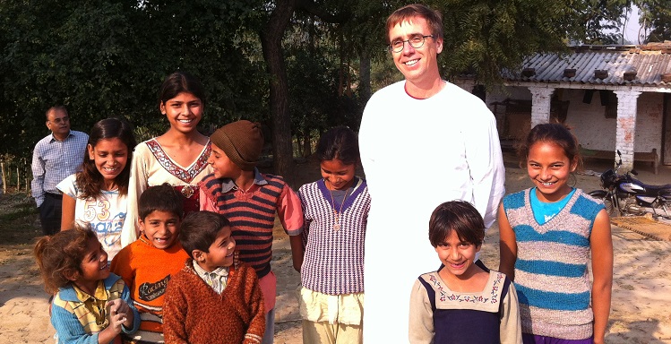 Dr. Harold Pardue, professor of information systems at USA, standing center right in this 2013 photo taken during a trip to India, learned to speak Hindi, the laguage of many of his students. 