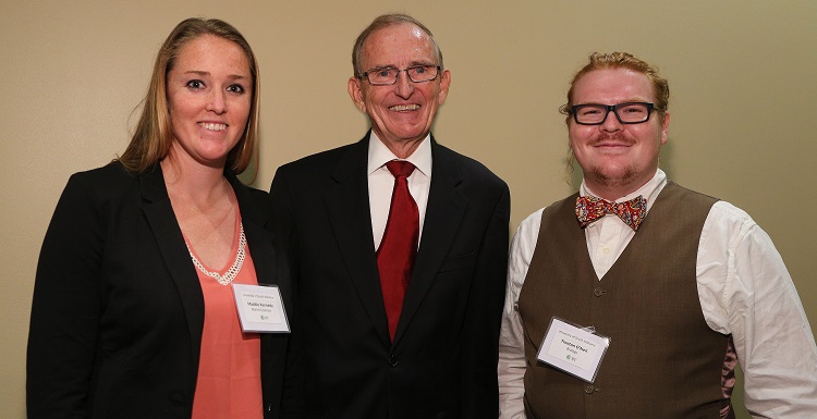 Dr. Keith Harrison, dean of the Graduate School, congratulates Maddie Kennedy, left, and Trenton O’Neal, following their presentations during the University’s 3rd Annual 3MT® Competition on Wednesday, March 23. 