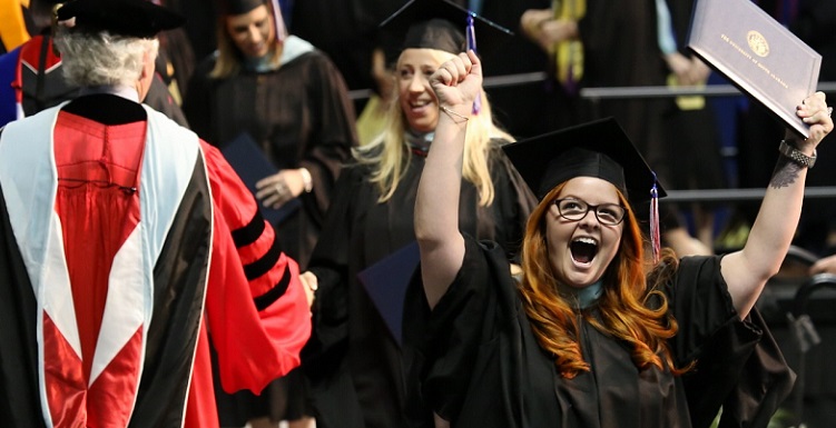 The University of South Alabama held two commencement ceremonies on Saturday, May 9, 2015, at the USA Mitchell Center. USA traditionally held one ceremony but split it in two to handle the increasing number of students, family and friends. The two commencement speakers were, pictured below from left, Dr. Richard Lapchick, internationally recognized sports sociologist, and U.S. Secretary of the Navy Ray Mabus.