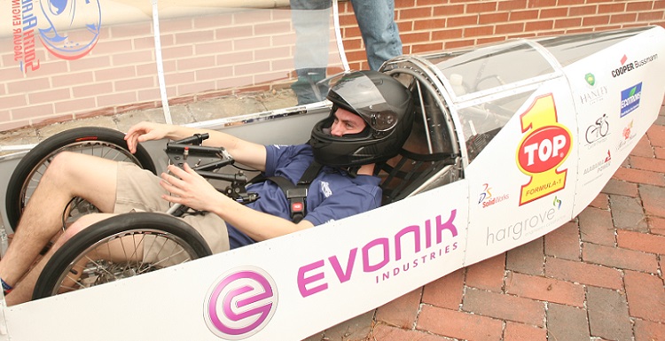 Brandon Troub, an engineering major at the University of South Alabama, demonstrates the USA Supermileage Car, which will be a highlight of the College of Engineering?s Car Show on Saturday at Shelby Hall on the USA campus. 