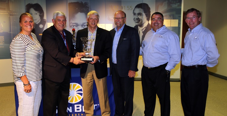 USA President Tony Waldrop, third from left, accepts the Vic Bubas Cup from University of Louisiana at Monroe President Dr. Nick Bruno. Others shown, from left, are USA Associate Athletic Director of Sports Medicine/Senior Women Administrator Jinni Frisbey, Sun Belt Conference Commissioner Karl Benson, USA Director of Athletics Dr. Joel Erdmann and USA Executive Vice President Dr. John Smith.