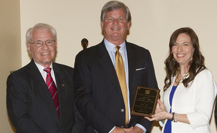 Richard Weavil, former president of the Mobile Area Association of Realtors, center, is named Outstanding Community Partner for 2013-2014. Joining him are Dr. Don Epley, professor of marketing and e-commerce in the Mitchell College of Business and director of the Center for Real Estate Studies and Dr. Julie Estis, president of the Faculty Senate.