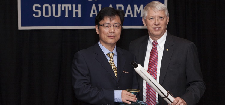 USA President Dr. Tony G. Waldrop, right, welcomes President Zuping Zhu and a delegation from Fuzhou University Zhicheng College in China to the University of South Alabama on Monday, Aug. 11. The two universities cooperate on study abroad programs for students and faculty. 