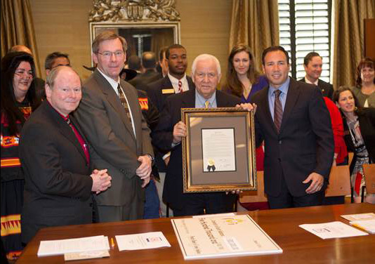 From left, Dr. Deidra Suwanee Dees, Poarch Band of Creek Indians' archivist; University of South Alabama Board of Trustees Chairman Dr. Steven P. Furr; USA Acting President Dr. John W. Smith; Buford Rolin, Poarch Band of Creek Indians' chairman; and Robert McGhee, tribal government relations adviser; stand Friday, March 3, with a resolution thanking the Escambia County, Ala., tribe for its gift of $500,000 to create the Poarch Band of Creek Indians Native American Studies Program.