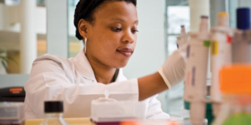 Researcher working in lab.