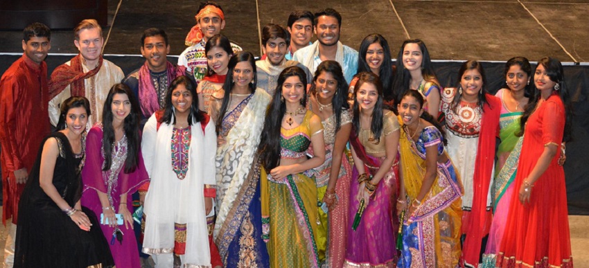 Indian Student organization members pose for a picture in their sarees