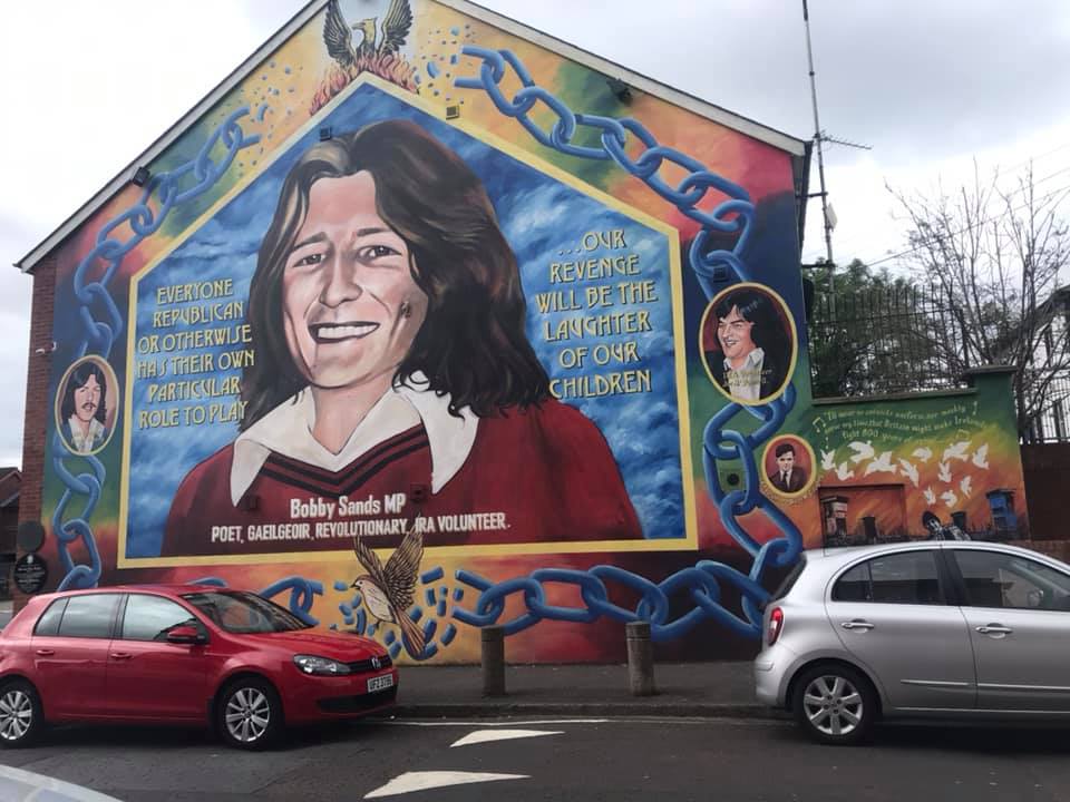 Woman painted on side of building in Belfast