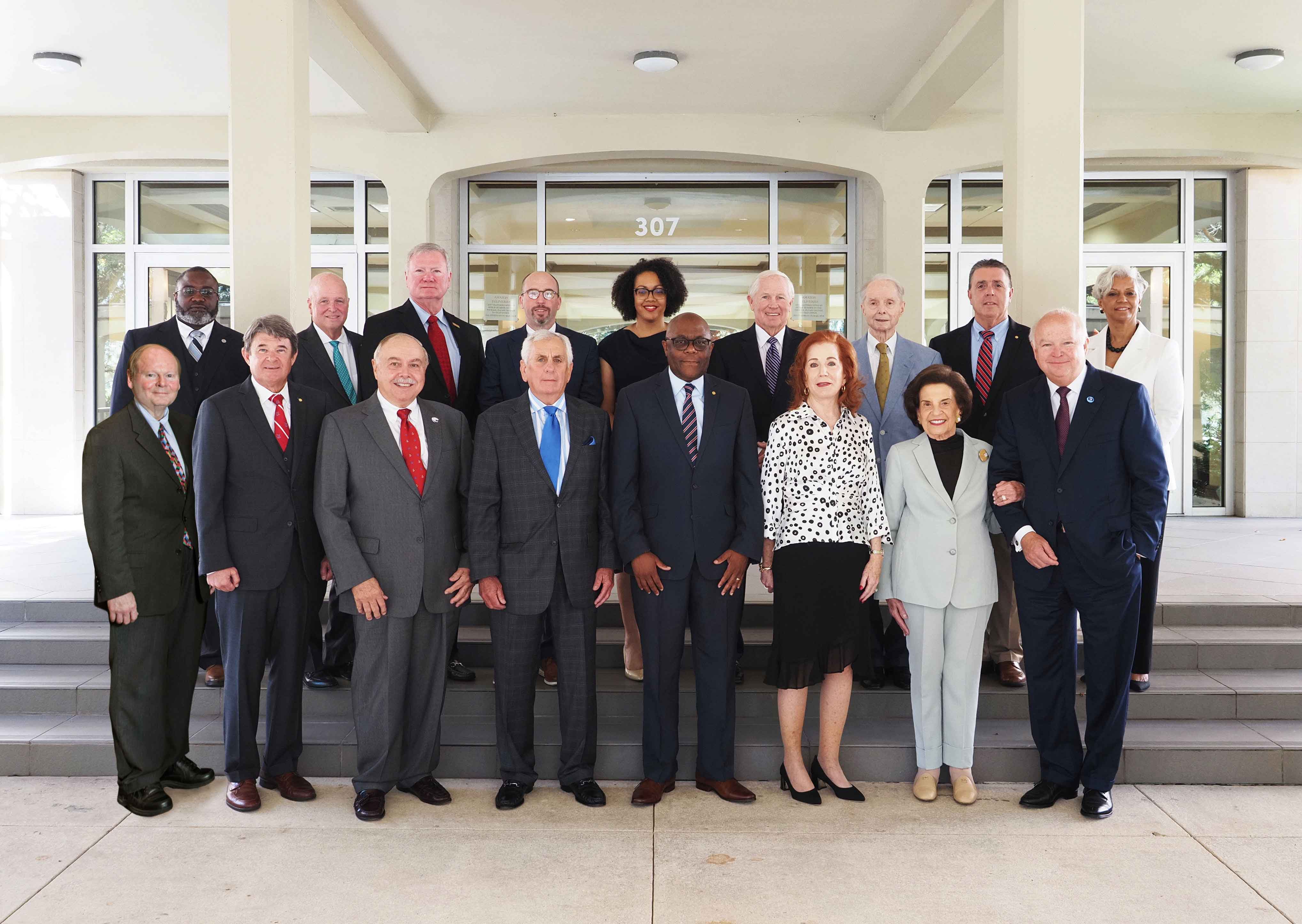 P​i​ctured from the left:  Honorary Trustee Abe Mitchell with Trustees Dr. Steve Furr; Dr. Scott Charlton; Ron Jenkins; Chandra Brown Stewart; Jimmy Shumock; Jim Yance; Ken Simon - Chair pro tempore; Ron Graham; Governor Kay Ivey - ex officio President and Chair​; Dr. Steve Stokes; Tom Corcoran; Lenus Perkins; Arlene Mitchell; Mike Windom; Alexis Atkins and Margie Tuckson; and President Tony Waldrop.