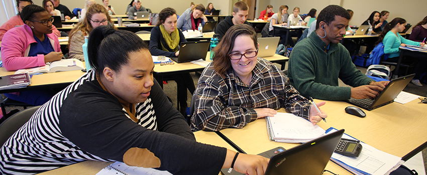 students working together in USA Baldwin County Campus class