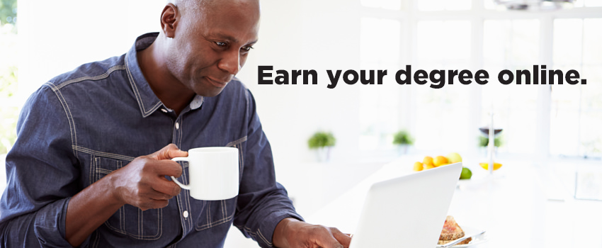 Man drinking coffee working on laptop with caption Earn Your Degree Online