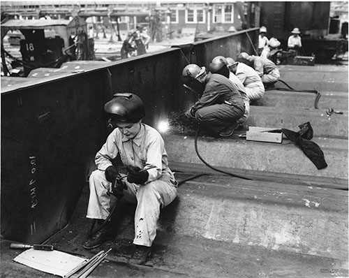 Women welders at work, 1/30/1945. 35C-B1-7 Alabama Dry Dock and Shipbuilding Collection, The Doy Leale McCall Rare Book and Manuscript Library, University of South Alabama.