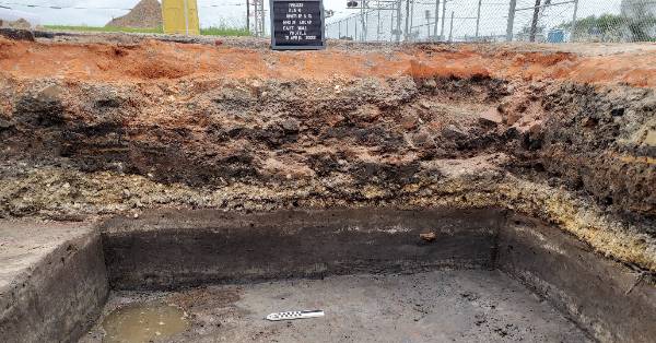 Layers of soil at the Madison Street Site with evidence of landfilling through time.