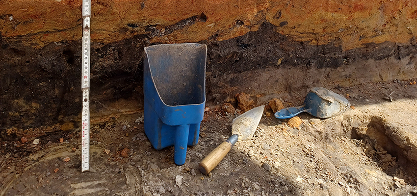 Soil layers from the I-10 Mobile River Bridge Archaeology Project. The orange and red layers are clay fill that was brought in during the construction of I-10.