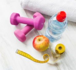 Weights, apple, water, and measuring tape.