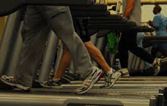 Bottom part of legs walking on treadmill